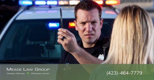 Law enforcement officer conducting a field sobriety test